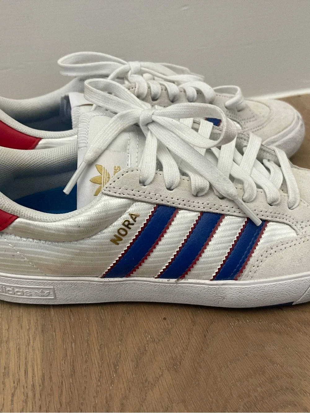 Adidas Woman’s Nora White Suede Sneakers with Blue Stripes & Red Heel